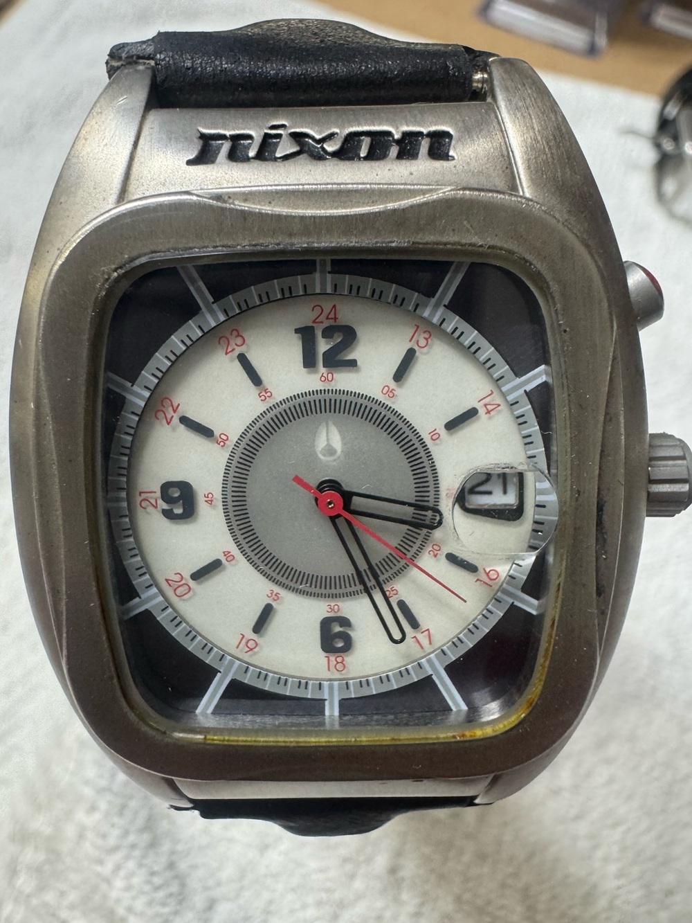 Nixon Silver Case Black Strap White Dial Men's Analog Watch